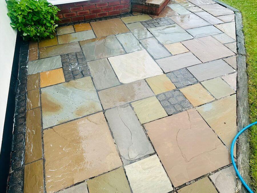 A freshly cleaned patio in Llanelli by Affordable Driveways and Patios