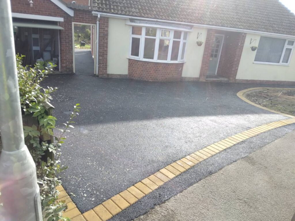 A newly installed tarmac driveway in Llanelli by Affordable Driveways and Patios
